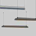 Three Modern Pendant Lights Hanging From Ceiling With Metal And Glass Illuminated Design