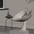 Modern Cream Upholstered Leisure Chair with Curved Backrest Circular Base and Side Table Glassware