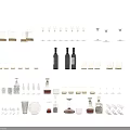 Various Wine Bottles and Glasses Collection with Different Glassware Styles and Designs