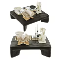 Elegant Coffee Table Featuring Open Book Sculpture Candle And Decorative Plate 3d model