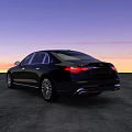 Black Luxury Sedan Parked On Gray Concrete Ground With Sunset Sky Background