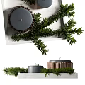 Decorative Ornament Set With Black Candles Green Pine Branches And Copper Accents On Tray