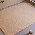 Square Beige Woven Rug In Indoor Display Area With Magazines Decorative Items And Blinds