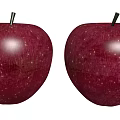 Two Fresh Red Apples With Shiny Skin And Golden Specks