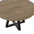 Modern Round Wooden Table With Black Geometric Legs And Smooth Tabletop