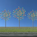 Three Colorful Windmill Shaped Architectural Structures Standing On Green Grassland Under Blue Sky