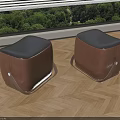Modern Brown Fabric Stools With Black Padded Seat And Carry Handles On Wooden Floor