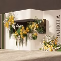 Wedding Floral Installation With Yellow White Flowers Green Foliage And Logo Backdrop