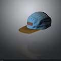 Stylish Blue Canvas Hat With Brown Brim And Leather Patch Detail