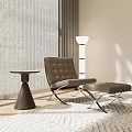 Brown Leather Lounge Chair With Ottoman Wooden Table Floor Lamp And Textured Rug On Floor