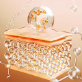 Advanced Skincare Essence With Transparent Sphere Orange Particles Pink Sheets And Molecular Structure
