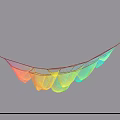 Colorful Wavy Net Art Installation Hanging Against Blue Sky With Support Pole