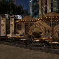 Outdoor Restaurant With Straw Umbrellas Tents String Lights And City Skyline At Night