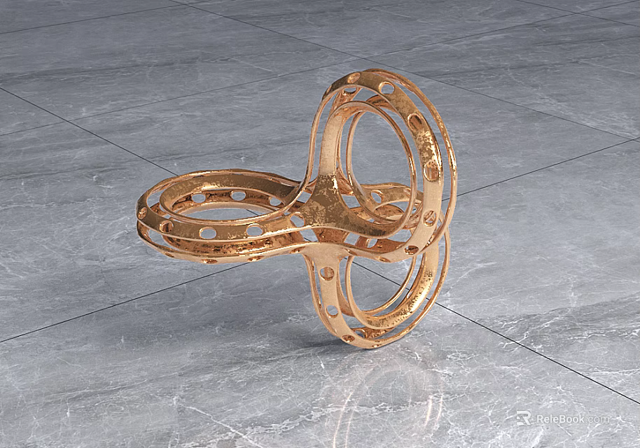 Golden Perforated Ring Shaped Decorative Ornament Set On Marble Floor For Elegant Modern Decor 3d model 