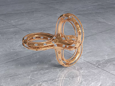 Golden Perforated Ring Shaped Decorative Ornament Set On Marble Floor For Elegant Modern Decor 3d model