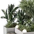 Outdoor Concrete Chair With Gray Cushions Surrounded By Green Plants And Round Lights