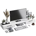 Computer Monitor Setup With Keyboard Mouse On Modern TV Stand And Decorative Plants