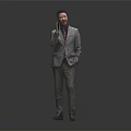 A Man In Gray Suit Red Tie Talking On Phone With Hand In Pocket