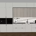 White Kitchen Cabinets With Integrated Appliances And Modern Countertop Design