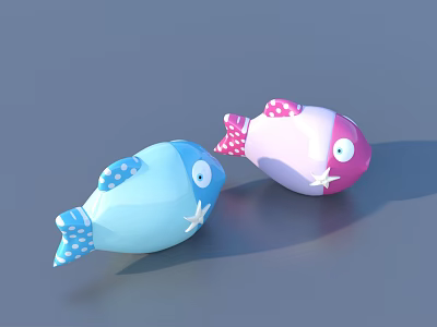 Blue And Pink Fish Shaped Toys With Star And Polka Dot Patterns And Eyes 3d model