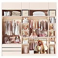 Organized Wardrobe with Hanging and Folded Clothes Dolls Stuffed Toys and Bookshelves