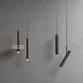 Modern Black Geometric Pendant Lights With Minimalist Design And Warm Lighting On Gray Wall