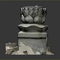 Stone Pillar With Lotus Shaped Top Carving And Intricate Base Design