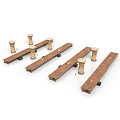 Wooden Scene Construction Components Featuring Long Planks And Cylindrical Bases
