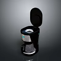 Black Electric Coffee Maker With Open Lid And Glass Carafe For Home Use