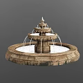Multi Tiered Stone Fountain With Decorative Sculpture And Flowing Water Streams