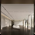 Spacious Modern Exhibition Hall Interior With White Curved Sofa And Wall Artworks