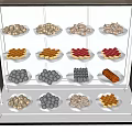 Delicious Assorted Foods Showcased on Multiple Shelves in Glass Case