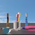 Colorful Oral Care Products On Blue Background With Toothbrushes Toothpaste And Cup
