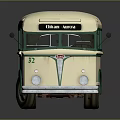 Vintage London Bus Model With Cream And Green Exterior And Reflective Surface Design