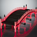 Red Japanese Style Arch Bridge With Black Deck Railing And Decorative Posts