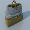 Gray And Yellow Tote Bag With Leather Handle And Zipper Detail On Smooth Surface