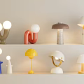Colorful Modern Table Lamps With Various Creative Designs On Display Shelf