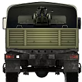 Green Military Truck With Canvas Covered Cargo Bed And Six Wheel Drive