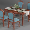 Elegant Dining Table Set with Wooden Table Blue Chairs Table Runner and Flower Centerpiece