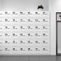 Organized Numbered Locker Shelves In Indoor Space With Cross Kay Signage