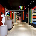 CAPAROL Specialty Store With Colorful Stripes Red Black Walls White Sculpture And Modern Design