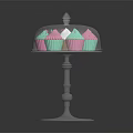 Colorful Pink And Green Cupcakes On Transparent Stand With Glass Dome
