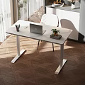 Modern Desk With Laptop Small Plant Pens White Chair And Sunlight