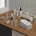 Folded Towels In Neutral Tones With Wooden Bathroom Accessories On Minimalist Bathroom Vanity Table
