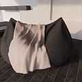 Modern Black Bean Bag Chair With Light Blanket On Wooden Floor And Light Walls