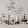 Modern Decorative Ornament Set Featuring Green Plant White Vase Books Sculptures And Sphere Ornaments