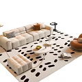 Modern Beige Sofa And Coffee Table Set With Black White Spotted Rug And Brown Armchair
