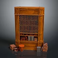 Wooden Bookshelf With Carved Design And Lattice Front Featuring Books Small Stool And Cardboard Boxes