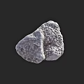 Grayish White Natural Stone With Uneven Surface Texture And Holes On Black Background