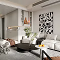 Modern Dining Living Room With White Sofa Black Coffee Table And Geometric Wall Art